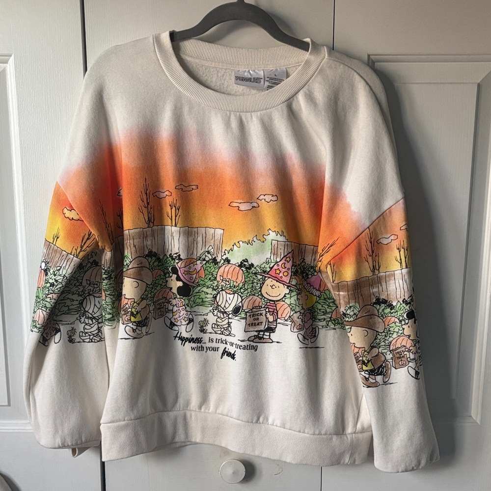 Peanuts Women's Sweater with Orange and Cream Graphic